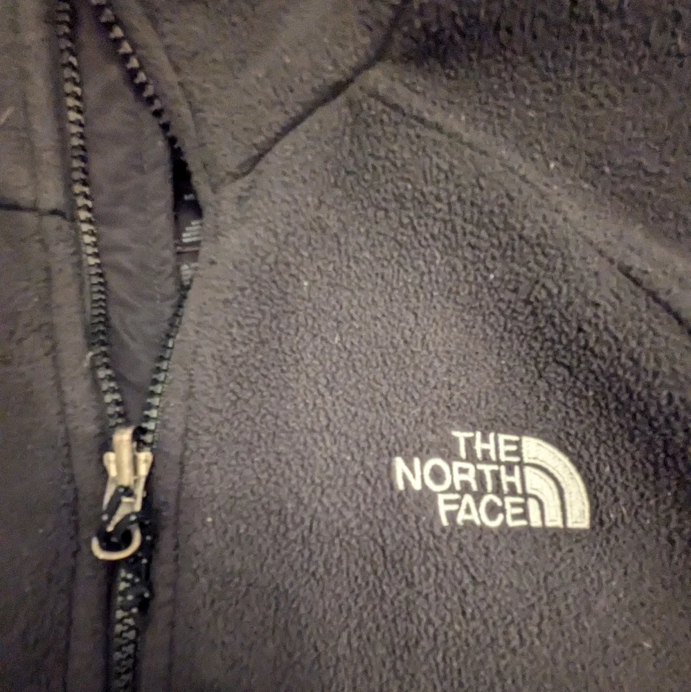 Men's North Face black zip up fleece, size small